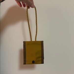 Lululemon Yellow and Brown Mini Pouch Luggage Tag